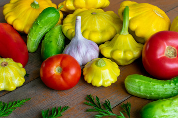 Vegetables on a wooden background close-up. Autumn rich harvest. Rural still life.
