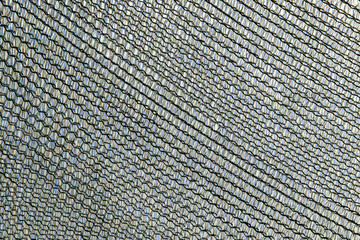 Gray mesh fabric as abstract background