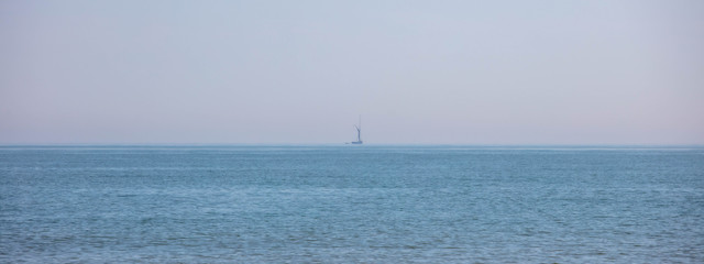 A sailing Barge On The Horizon