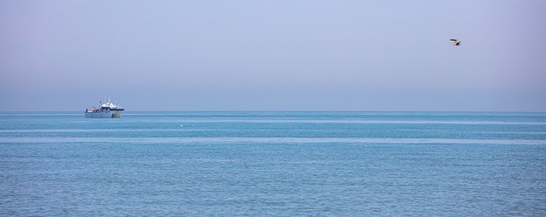 Naklejka premium The Boat in the distance