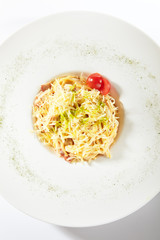 Delicious Spaghetti Carbonara with Grated Parmesan Cheese Isolated