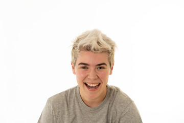 Portrait of attractive cheerful transgender young man with smiling happy face. Human expressions and emotions