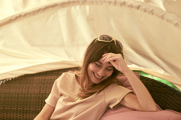 portrait of a woman on a park bench