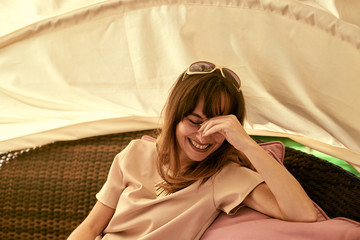 portrait of a woman on a park bench