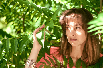 portrait of a woman in tree branches