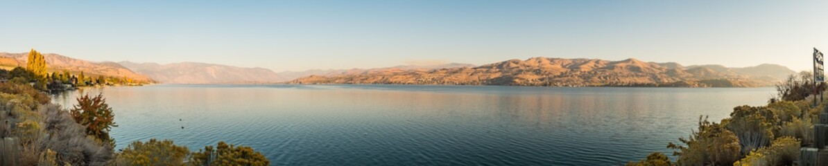 Fototapeta premium Sunrise views of the shores of Chelan Lake, Washington, USA.