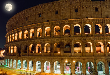 Fototapeta na wymiar Moon over Colosseum in Rome