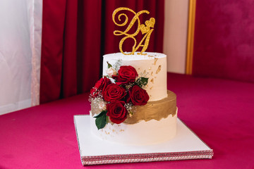 Wedding image and a bridal bouquet with red flowers	