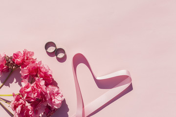 Top view pink decoration with wedding items