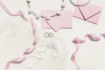 Flat lay cute wedding arrangement on white background