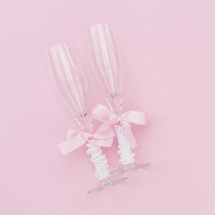 Champagne glasses with bows and pearls