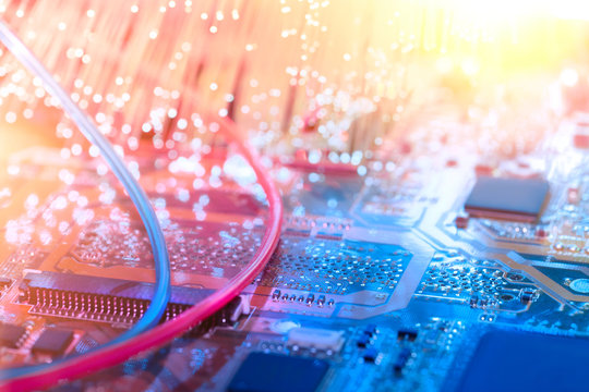 Closeup on electronic board and neon electric lights