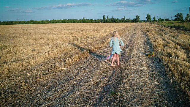 Games in the dry field. Large hay field