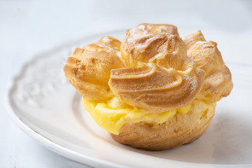 Obraz na płótnie Canvas golden french custard cream puff pastry