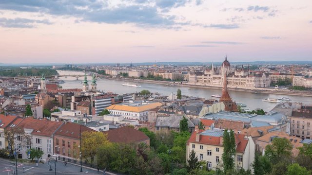 Budapest Hungary time lapse 4K, city skyline day to night timelapse at Hungarian Parliament and Danube River