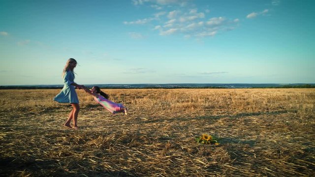 Games in the dry field. Large hay field