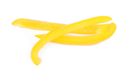 Cut yellow bell pepper isolated on white