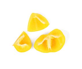 Cut yellow bell pepper isolated on white, top view