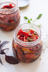 sun-dried tomatoes in a  jar close-up