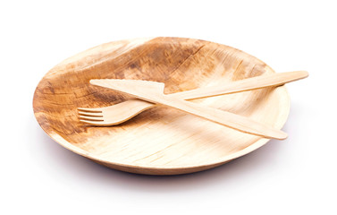 Teller aus Palmblatt mit Besteck aus Holz