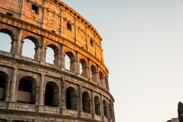 Fototapeta premium Rome Coloseum with beautiful colourful sunset
