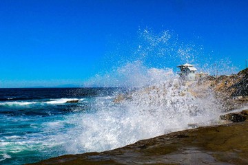 waves crashing on rocks