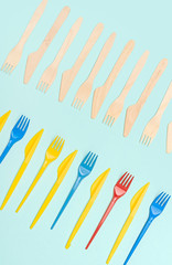 Rows of plastic and wooden cutlery