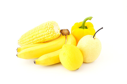 Healthy Food set yellow fruits and vegetables sweet pepper,banana,corn,lemon,Chinese pear isolated on white background