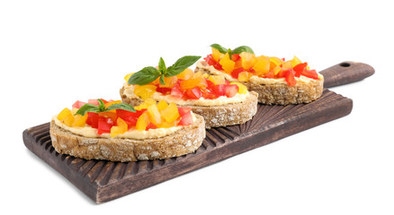 Tasty fresh tomato bruschettas on white background