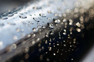The rain drops on stainless steel