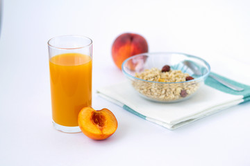 glass of orange juice and fruits