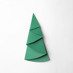 Christmas tree made of paper on white background, top view