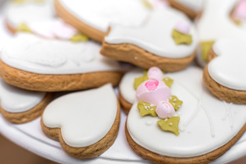 Closeup of gingerbread cookies in a white glaze. Stylish pastries as a decoration for the holidays.