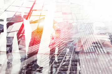 Background with business people silhouette at sundown. Double exposure and light effects