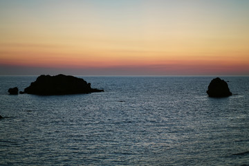 Beautiful sunset seen from the balcony of a tavern in Prasoudi, Corfu