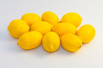 yellow lemons on white background
