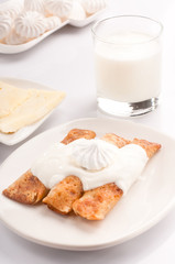 Appetizing pancakes on a white background.