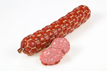 Tasty meat sausages over white background