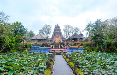 Pura Taman Kemuda Saraswati Temple in Ubud, Bali island, Indonesia. The temple is surrounded by lotuses