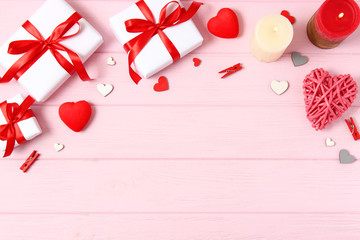 Gifts and hearts on a colored background top view. Love. Valentine's day background with place for text insertion.