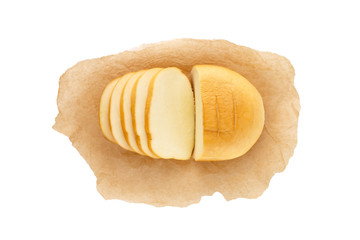 Cheese on parchment paper. Smoked cheese close-up on a white background. Top view.