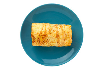 Cheese on a plate on a white background. Cheese with spices on a plate. Top view.
