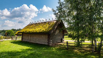 Fototapeta na wymiar old log house in the village