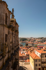 Fototapeta premium Old houses and tile roofs in the old town of Porto, Portugal