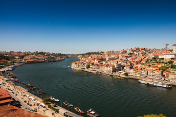 Fototapeta na wymiar Panoramic view of Douro river at Porto, Portugal