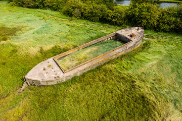 Aerial view of abandoned hulls of boats at the Purton Hulks (Ship Graveyard)