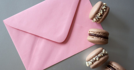 Envelope and macarons.