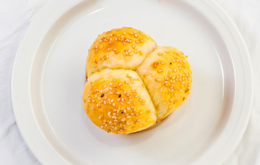 Soft No-Knead Heart shaped Buttery Dinner Rolls with Sesame seeds.
