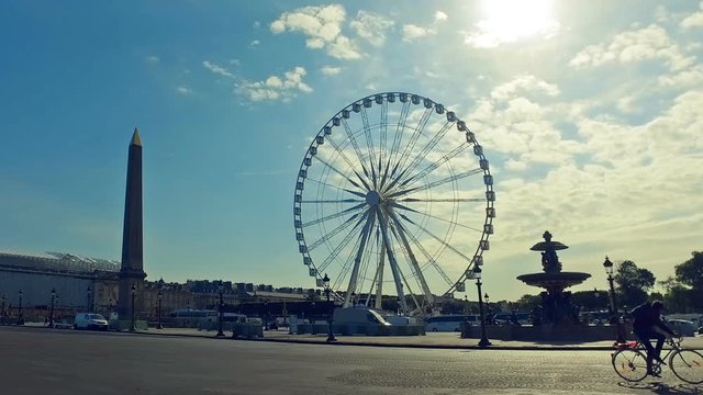 Morning rush hour car traffic in Paris, commuting scene, Place de la Concorde