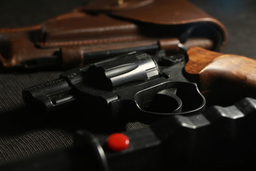 Obraz premium gun on black background